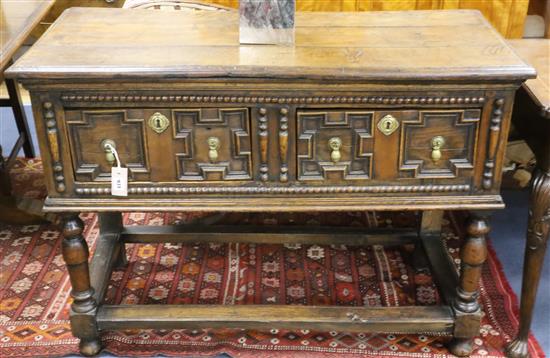 A 17th century style oak dresser base, W.114cm